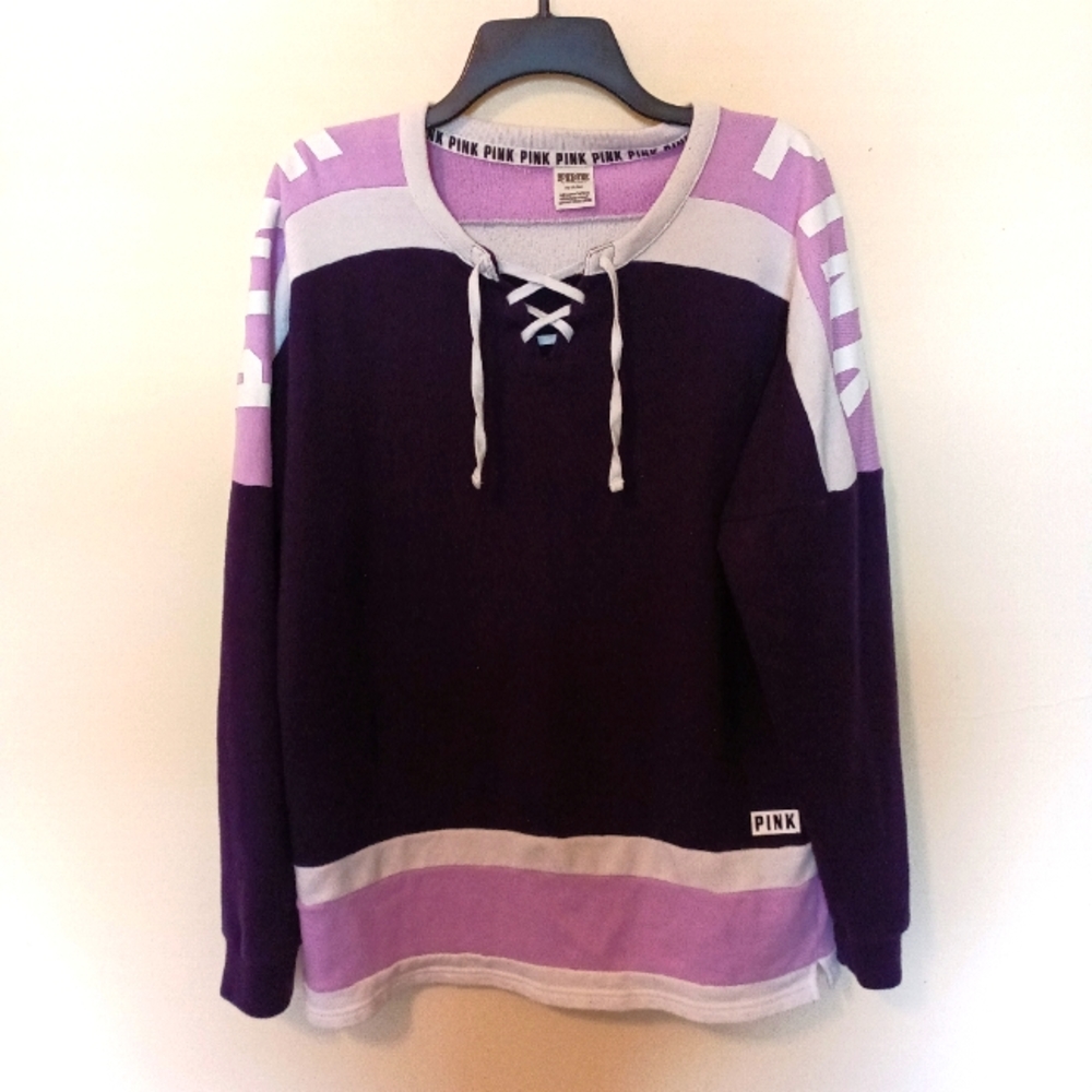 PINK long sleeve lace up T-shirt.